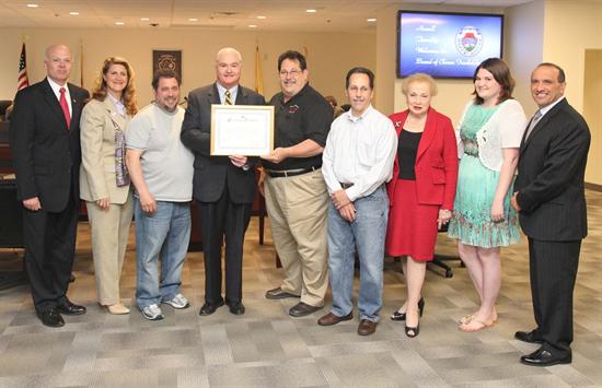 Monmouth County Board of Chosen Freeholders present a certificate of recognition to Puglisi Farms of Howell. Monmouth County Board of Chosen Freeholders present a certificate of recognition to Puglisi Farms of Howell.